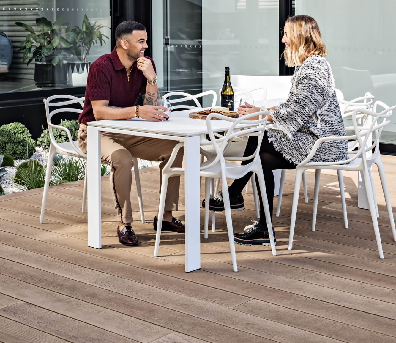 Guy and Jules Sebastian on Golden Oak Millboard Decking