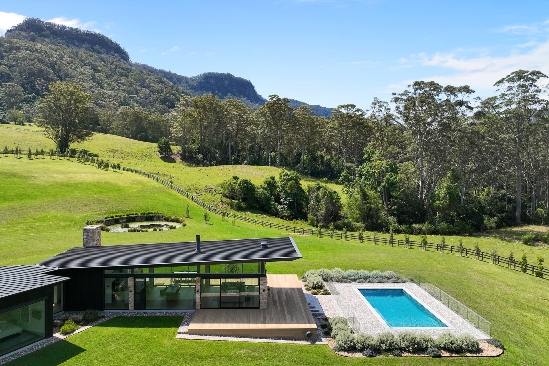 Outdoor dining and fireplace around composite deck